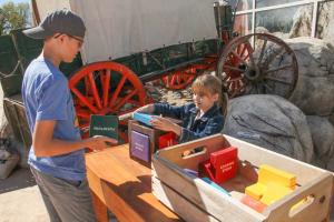 Reenactment National Cowboy Museum  with two kids