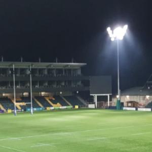 Photo of High Mast Light Poles at a Small Stadium