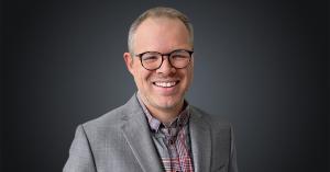 headshot of Adam Flater