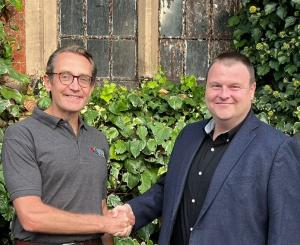 VPS CEO and Nexus MD skae hands as the acquisition heralds a perfect fit