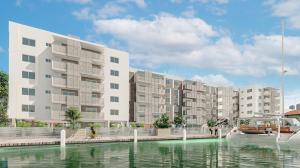 This image shows a computer rendering of what the building will look like when finalized, as seen from the wtaer