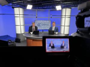 Co-hosts of the EL-PFDD live stream surrounded by cameras and tech equipment.