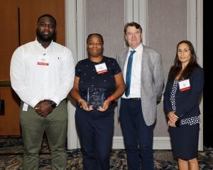 Left to Right: Assistant Director Jason Simmons, Director Gwen Broadway, CEO Peter Evers, and EVP Ulea Lago