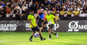 Jay Jay Okocha playing on the field during OmegaPro Legends Cup