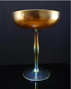 Large 1920 Steuben aurene art glass footed bowl, 8 ¼ inches tall by 6 inches wide (est. $1,000-$5,000).
