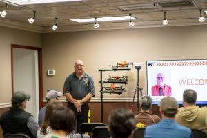 Robert Lycke Addresses Audience