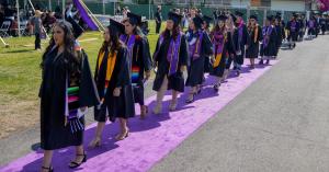 line of graduates