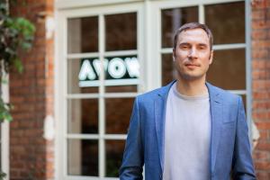 Robert Wildner, Founder & CEO of AVOW, standing outside of Berlin office