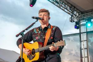 Alex Miller on stage at Kentucky State Fair  by Ryan Pike