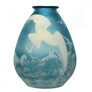 Signed Galle French cameo art glass vase, 11 inches in height, having a beautiful ice blue ground with white cameo carved overlay featuring sixteen seagulls in flight over ocean waves.