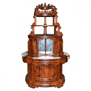 Circular bank/hotel foyer cabinet by Phillip Kopp, 105 inches tall and 63 inches in diameter, made in 1850 from burl walnut, a two-tiered cabinet, having four sections of white marble with mirrors.
