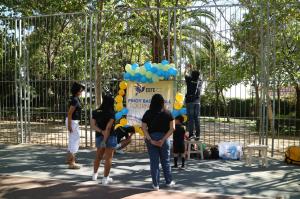 Filipinos set up balloons for the basketball tournament opening