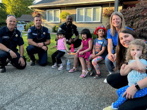 Redmond Police sitting with parents and kids