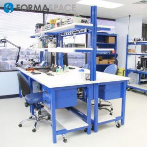 back-to-back workbench with a vibration isolation kit and ESD protection for handling sensitive electronics