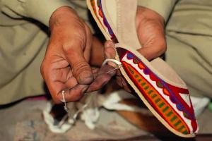 Fuchsia Shoes are stitched by hand by skilled shoemakers in Pakistan.