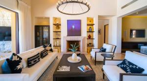 A lovely sitting area with neutral tones with touches of Mexican traditionalism and modern.