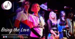 Multi national man and woman singers on stage