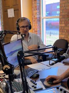 Len Assante radio host, in studio, discussing the relevant political issues facing Middle Tennessee.