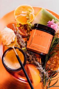 Nectar Blossoming Body Cleanser is shown with featured ingredients.