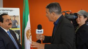 Mr. Alireza Jafarzadeh, the deputy director of the NCRI-US, being interviewed by media at a briefing on Oct 19, 2022 at NCRI office in Washington, discussing Iran uprising and prospects for the change of the regime. Dozens of reporters attended.