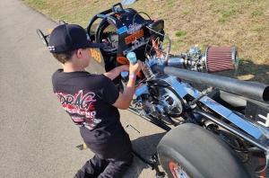 Ten-year-old Cooper Lawson uses Tufoil Engine Treatment in his motor oil as well as Tufoil Gun-Coat on the drive chain each day for consistent drag racing performance.