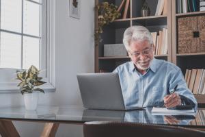 Man planning his exit strategy at desk