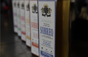 Sobreo bottles lined up along a bar