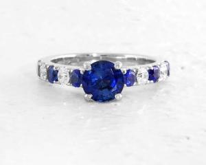 Round Sapphire And Diamond Side Stone Ring