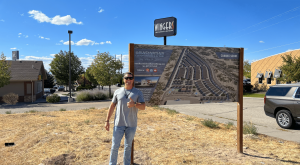 Ryan Rodney Standing In Front Of His Property. As the founder of Riverbound Custom Storage. He is a family man and accomplished entreprneur.