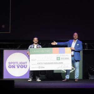 Legalboards CEO Rafael accepting the cheque for "Most Improved App"