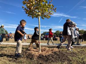 K-5th graders helped plant and mulch trees