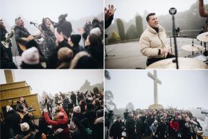 Planetshakers band and Planetshakers Bible College students are pictured during the recording of GREATER: Live At Chapel on a mountaintop vista near Melbourne, Australia.