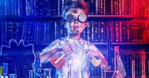 Mad scientist boy mixing crazy concoction