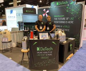 Two Brothers stand in Booth at ASRM