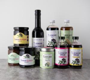 Carmel Berry's full product line: 8 oz Fresh-Pressed Elderberry Syrups, 4 oz Elderberry Syrup, 4 oz Elderflower Syrup, Elderberry Meyer Lemon Marmalade, Elderberry Blueberry Preserves, Elderflower Pluot Preserves, , Elderberry Balsamic Vinegar, Elderflower Comfort Tea.