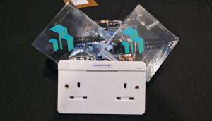 measurable.energy socket with the Most Innovative New Hardware Product award trophy.