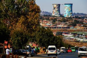 Stock image of Soweto Township by township advertising South Africa.