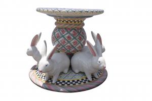 MacKenzie-Childs porcelain bunny rabbit table base featuring five rabbits surrounding a central pedestal and base, decorated in a combination of patterns (est. $1,000-$3,000).