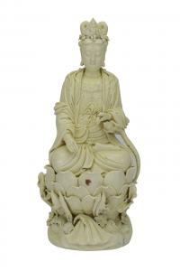 Chinese blanc de chine (white glazed porcelain) statue of Quan Yin (the goddess of compassion, also known as Guanyin or Kuan Yin), shown sitting atop a lotus blossom (est. $1,000-$10,000).