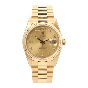 Rolex Day-Date “President” wristwatch, Ref. 18038, circa 1988, with 18kt yellow gold case and bracelet and champagne diamond dial, serviced by Rolex Aug. 2002 (est. CA$28,000-$35,000).