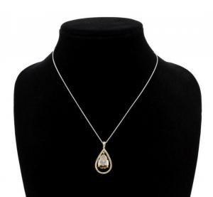 Neiman Marcus pendant with an 8.00-carat, pear-shaped, brilliant cut cognac diamond with VS-2 clarity, brown in color, in a tear drop shape frame (est. $65,000-$130,000).