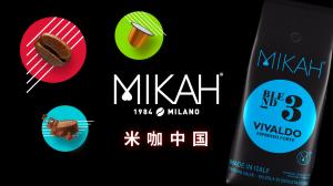 White Mikah logo and chinese logo on black background with a a coffe bag on right side
