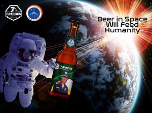 7 Bridges Brewing imagines an astronaut during an EVA floating behind a bottle of the company's award winning Imperial IPA with the Earth below and a glorious sunrise