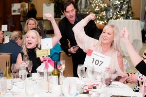 Excited Attendees from 2019 Event Participate in Live Auction
