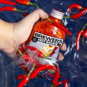 A bottle of hot sauce called Dragon Sauce is made from the byproducts of brewing