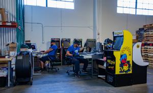Members working in a warehouse space