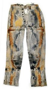 These miner’s work pants with a button fly, recovered from the 1857 sinking of the S.S. Central America, are the oldest known California Gold Rush-era jeans of their kind and may have been made by or for Levi Strauss. (Photo credit: Holabird Western Ameri