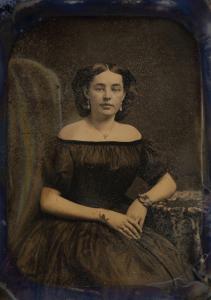 A daguerreotype of an elegantly dressed, unidentified woman was among the photographs recovered from the fabled “Ship of Gold,” the S.S. Central America that sank in 1857. (Image courtesy of Holabird Western Americana Collections.)