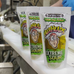 Extreme sour pouched pickle. Wally Warheads on cover making sour face.