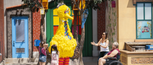 Sesame Place - Big Bird hanging out with guests of different abilities
